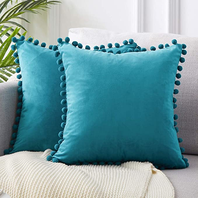 Cushions with Decorative Pompoms